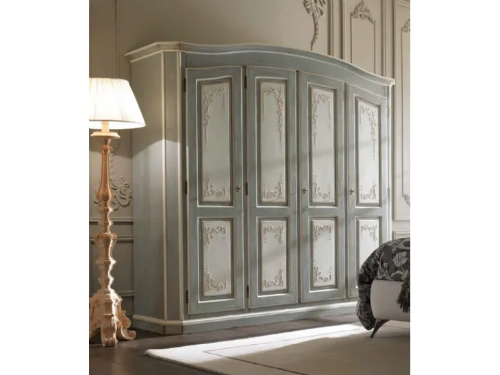 Armadio con ante battenti in legno con decori intagliati Art 2613 di Vittorio Grifoni