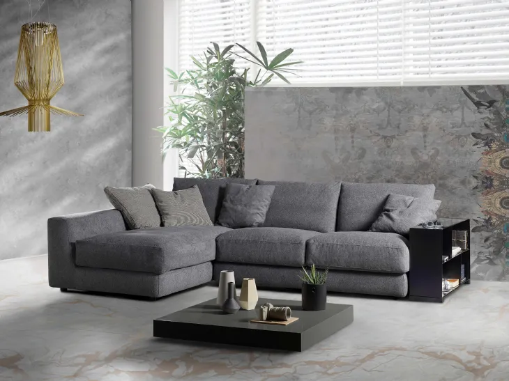 Divano con penisola in tessuto con bracciolo libreria in metallo Dafne di Salvetti